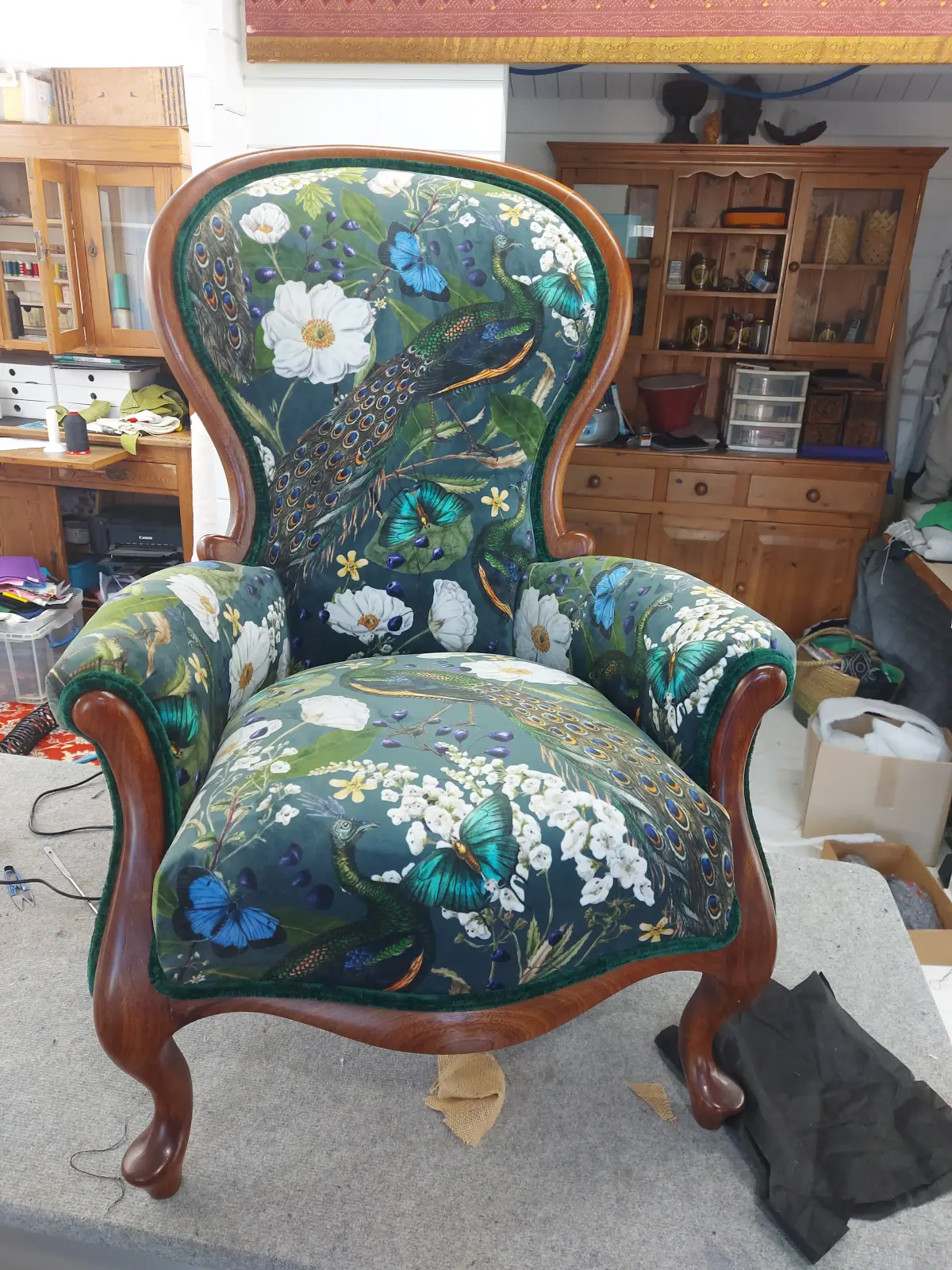 Peacock fabric armchair